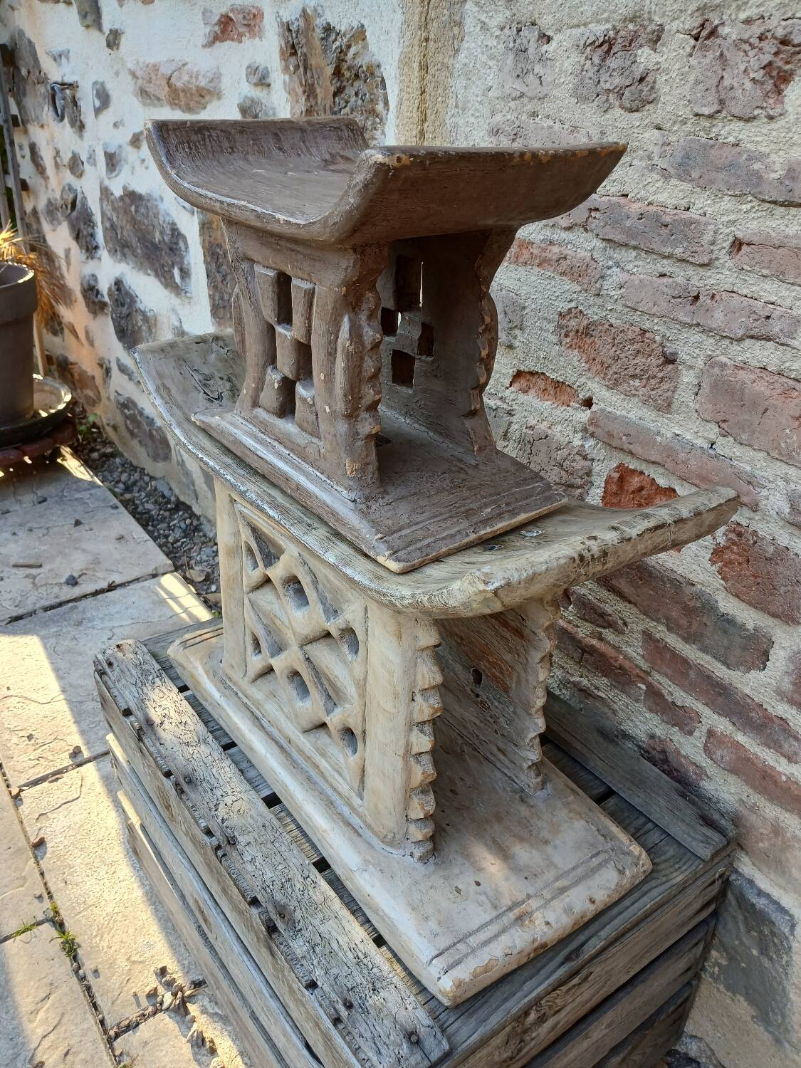 2 African carved wooden stools