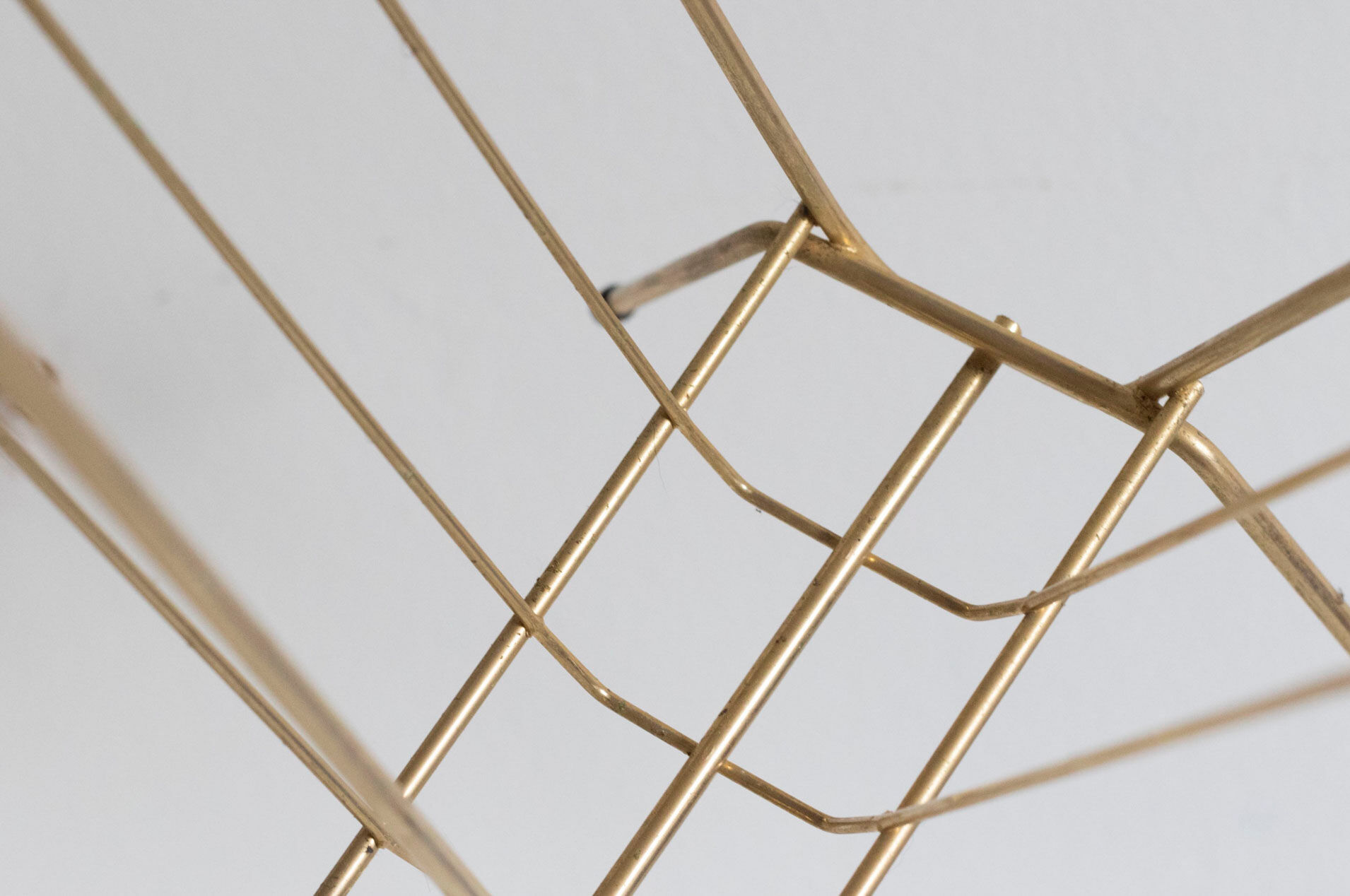 Vintage magazine holder in gold metal