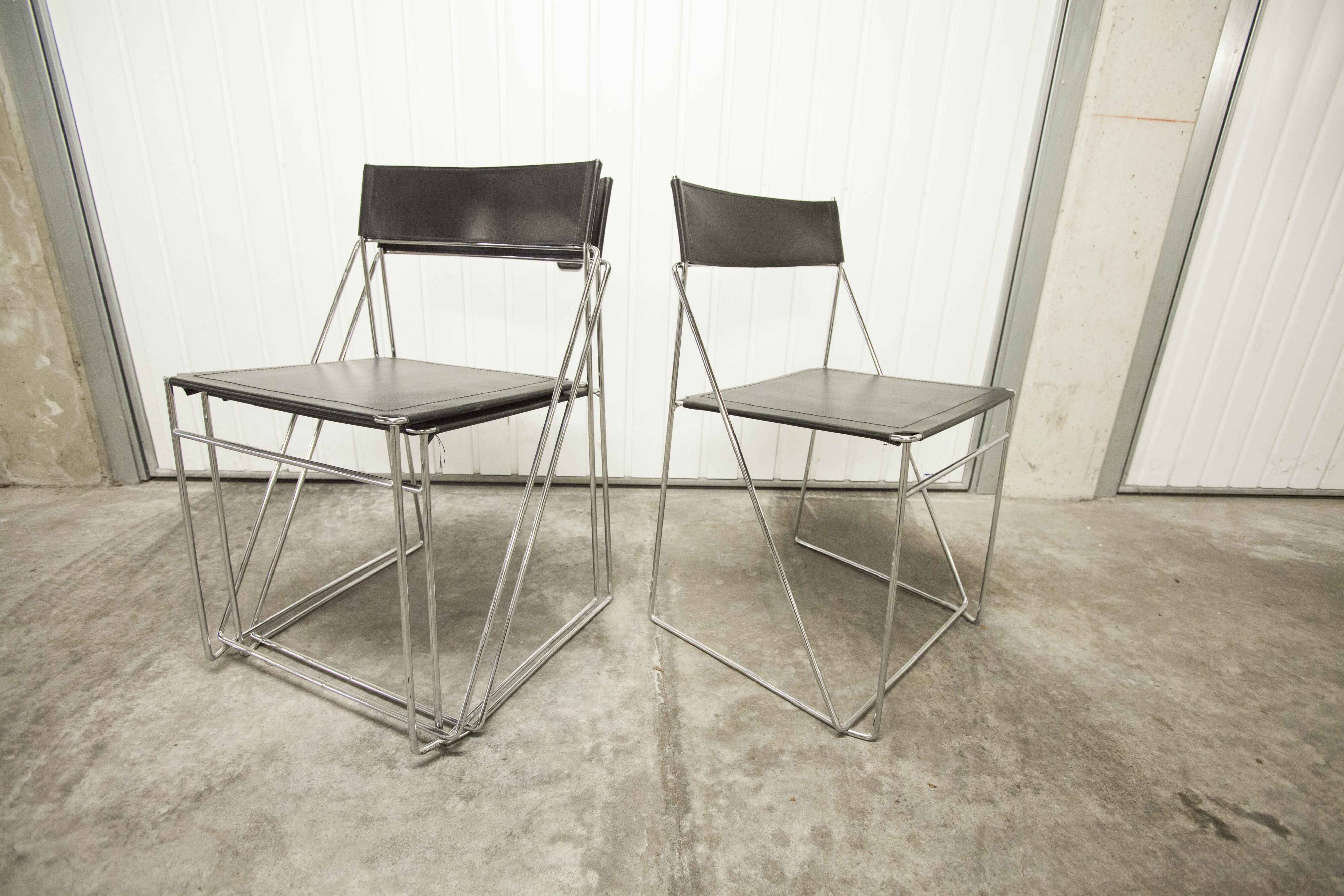 Set of 3 minimalist X line chairs by Niels Jorgen Haugesen.