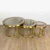 Vintage round nesting tables in gilded bronze with smoked glass