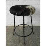 Vintage stool lined with cowhide