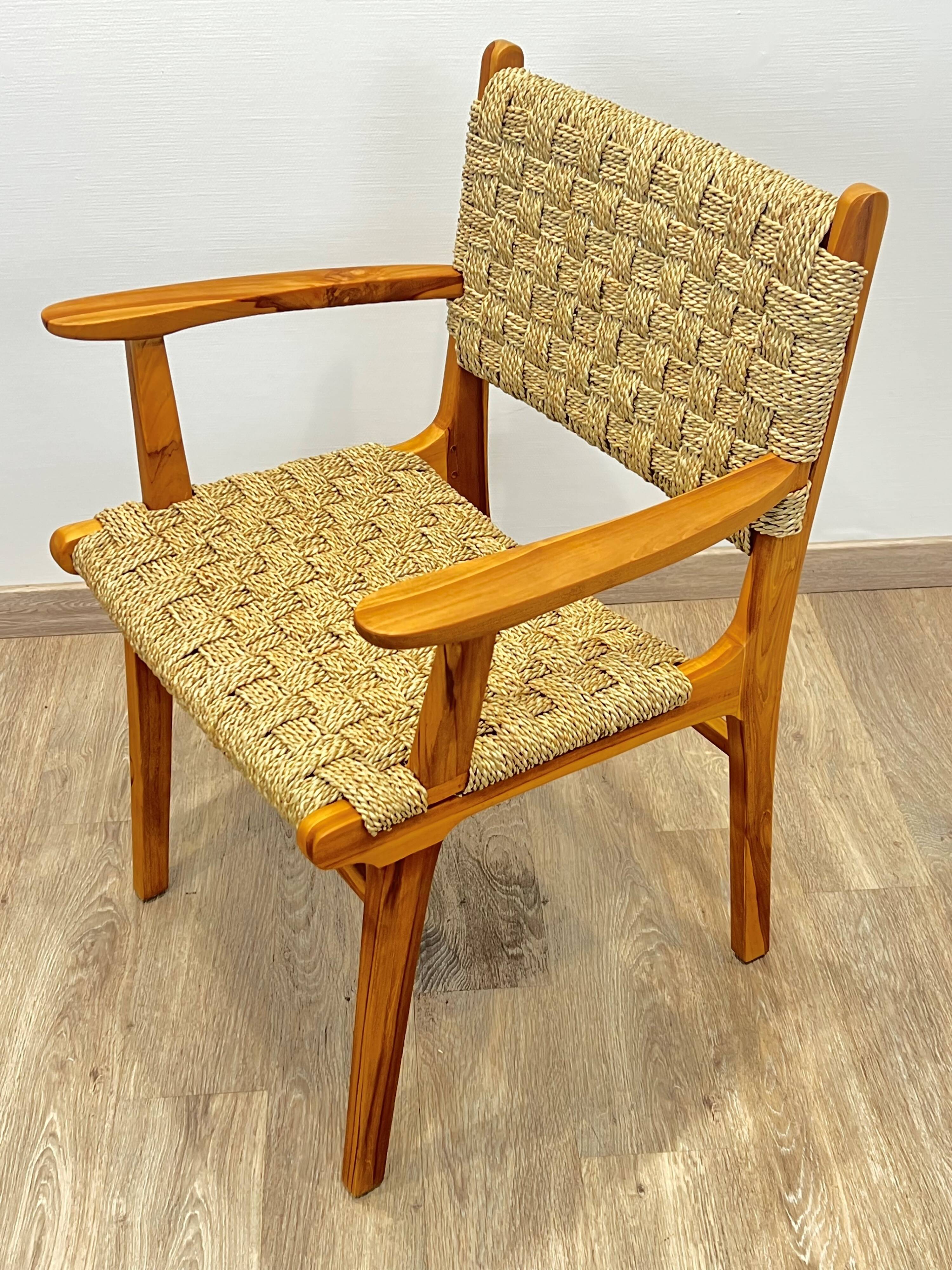 Pair of woven teak armchairs