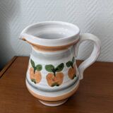 Ceramic pitcher with apple motif