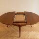 Round extendable oak dining table