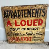 Old plaque “Apartments for rent”