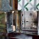 Vintage wall ashtray in shiny metal industrial style
