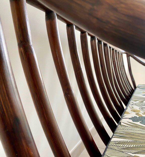 Vintage rattan bench from Maison Kok