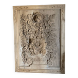 wooden painting with carved floral motif - note a restoration on the left side at the bottom.