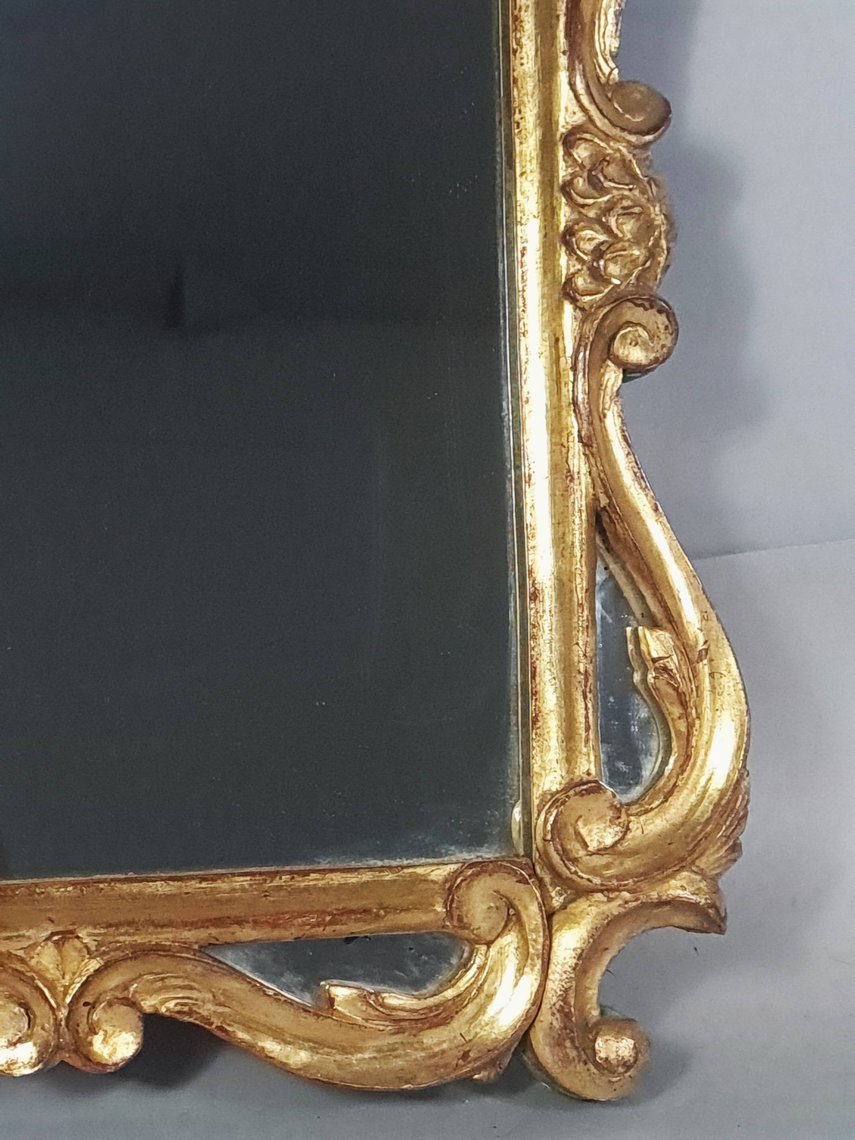 Antique mirror with carved wooden frame and original gilding, 53x37 cm, SD207.