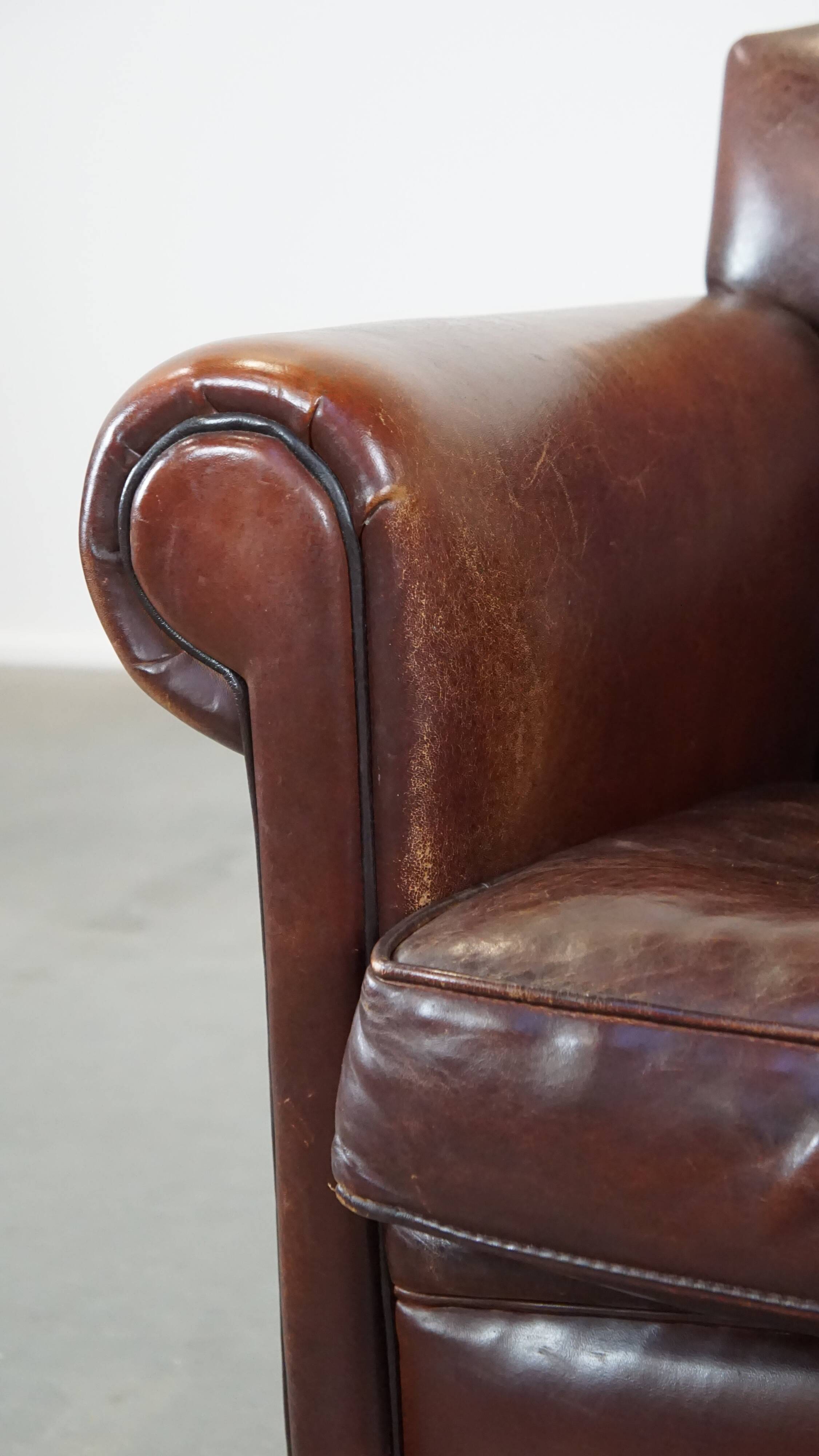 Design armchair made of sheep leather with a clean finish