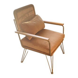 Rattan and velvet armchair