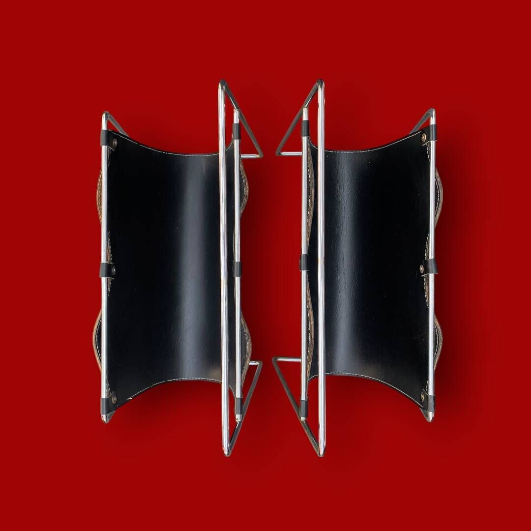 Pair of magazine racks in chromed metal and black leatherette, 1970s