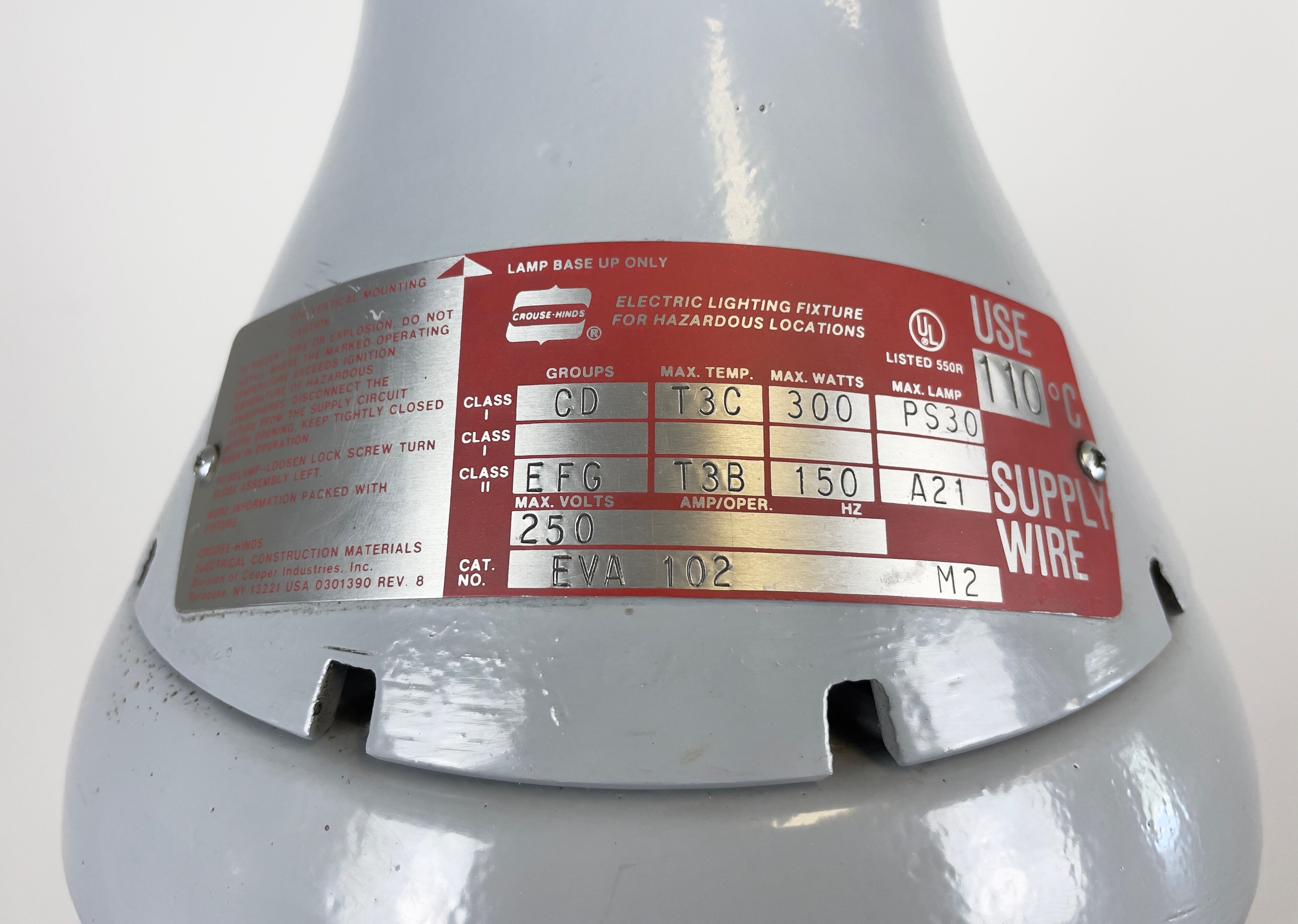 Grey industrial explosion proof light from Crouse-Hinds, 1970s