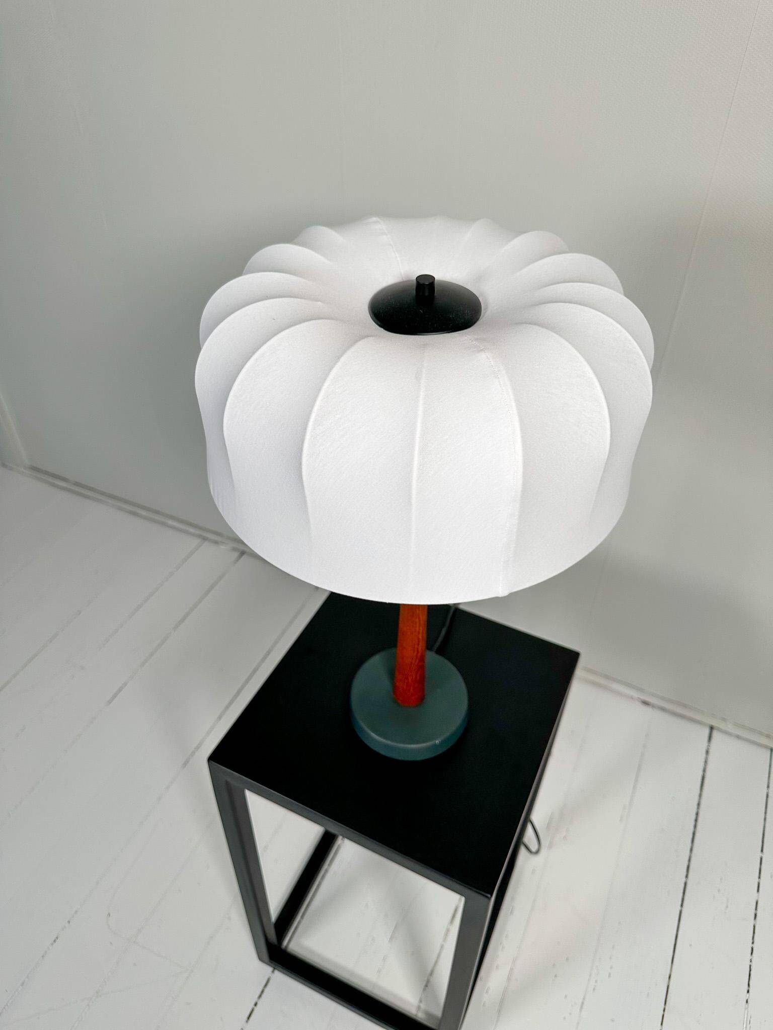 Mid-century teak and cotton table lamp by Einar Bäckström, Sweden, 1950s.