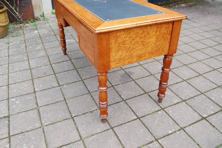 Louis Philippe period desk in mottled maple and cherry, 19th century.