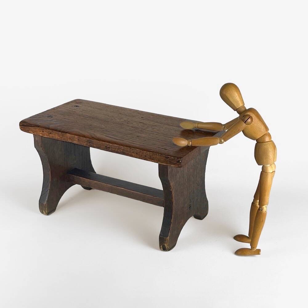 Small old wooden bench or footstool