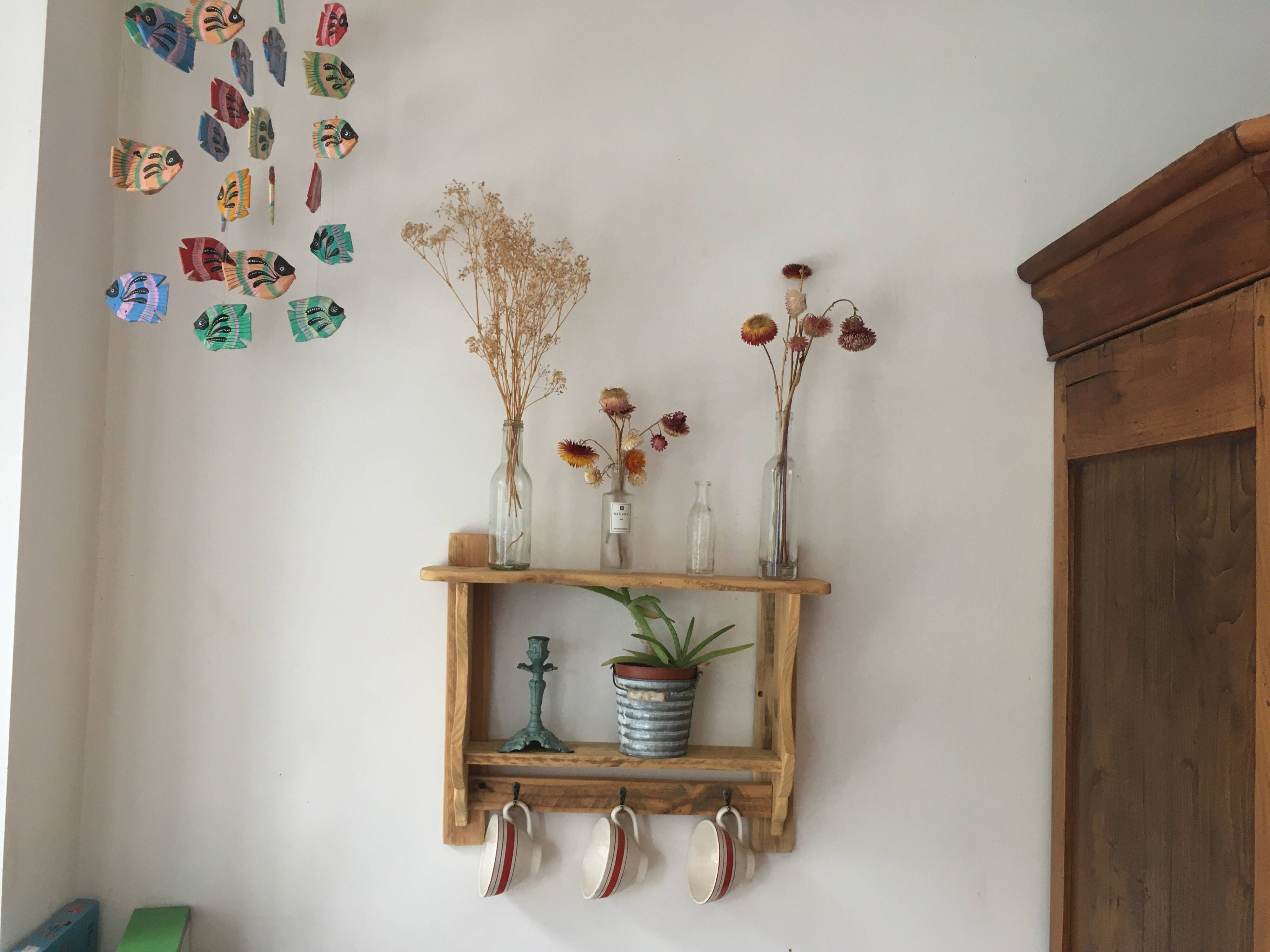wall-mounted bakery shelf