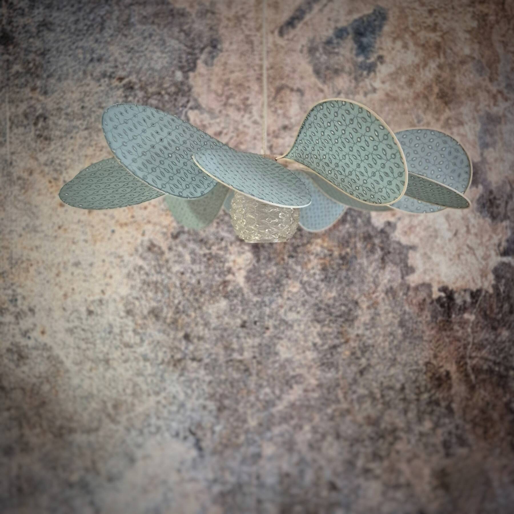 12-petal rattan and sage embroidery pendant light + vintage globe