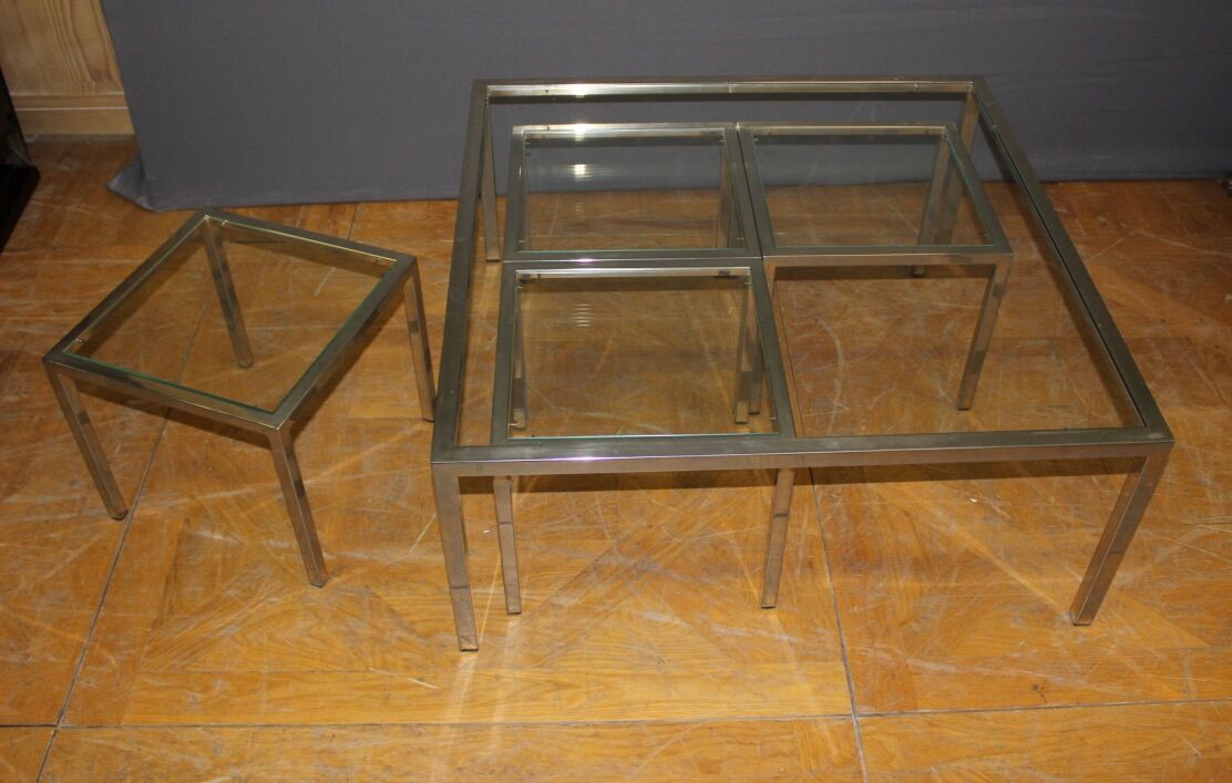 Coffee table and its steel and glass wiggles around 1970