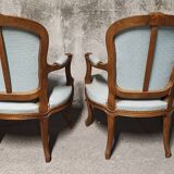 Reupholstered Louis XV convertible armchairs