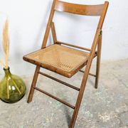 Folding chair with a cane seat