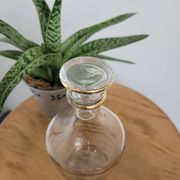 Small glass bottle with gold edges