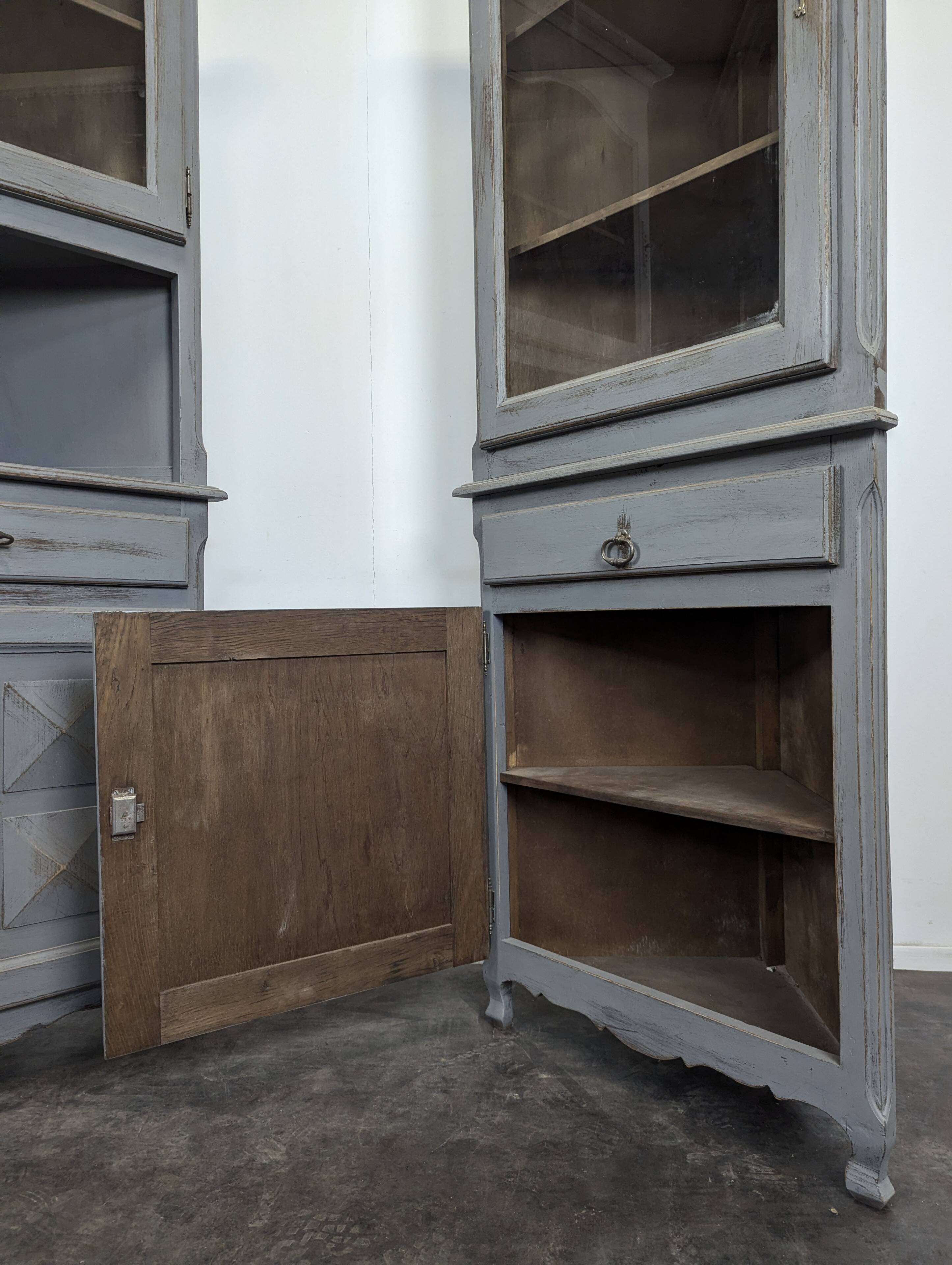 Pair of re-edged corner cabinets