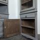Pair of re-edged corner cabinets