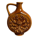 German round vase with floral motif, ornamental brown ceramic jug with handle