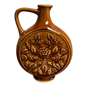 German round vase with floral motif, ornamental brown ceramic jug with handle