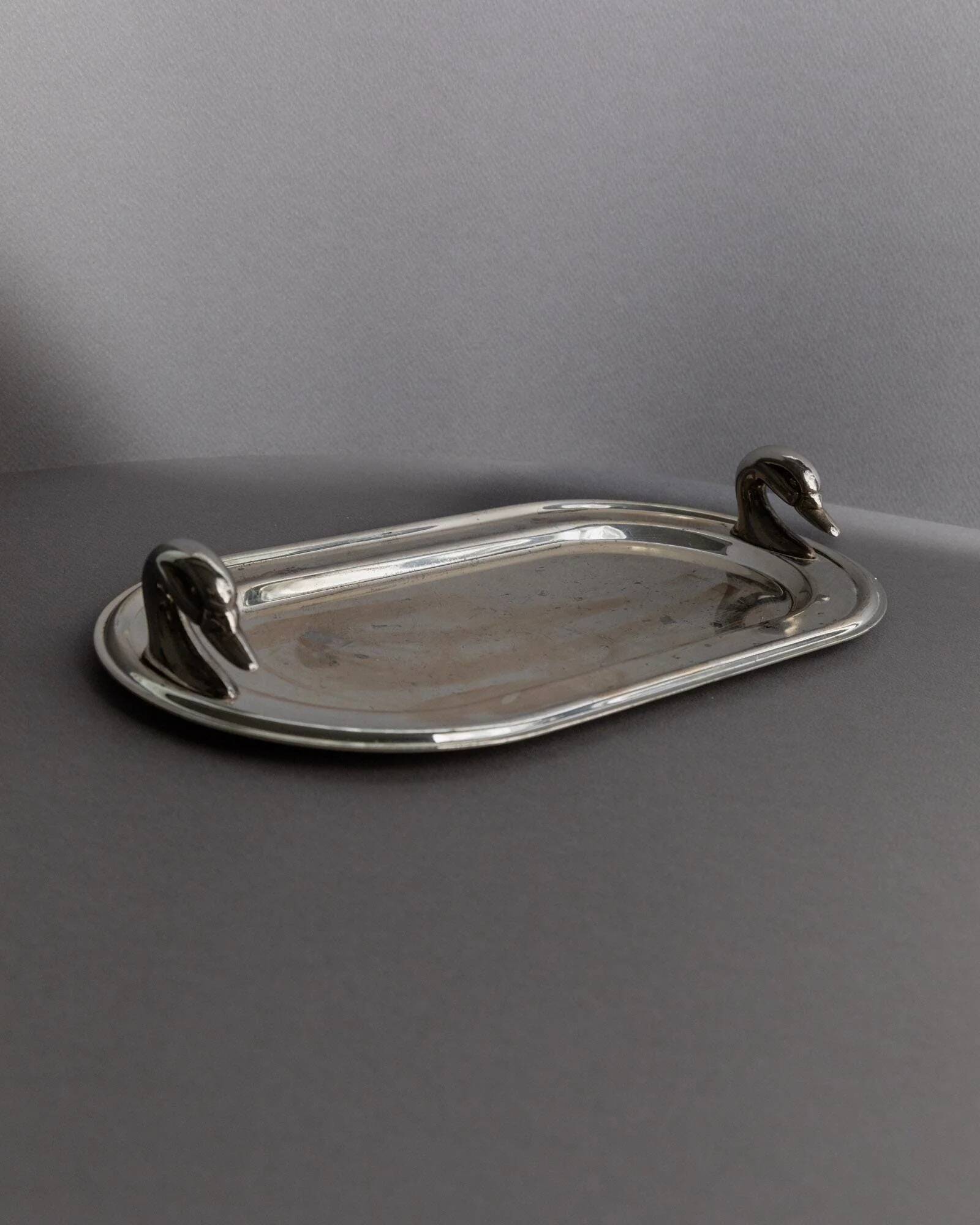 1960s vintage silver-plated oval tray with swan head handles.