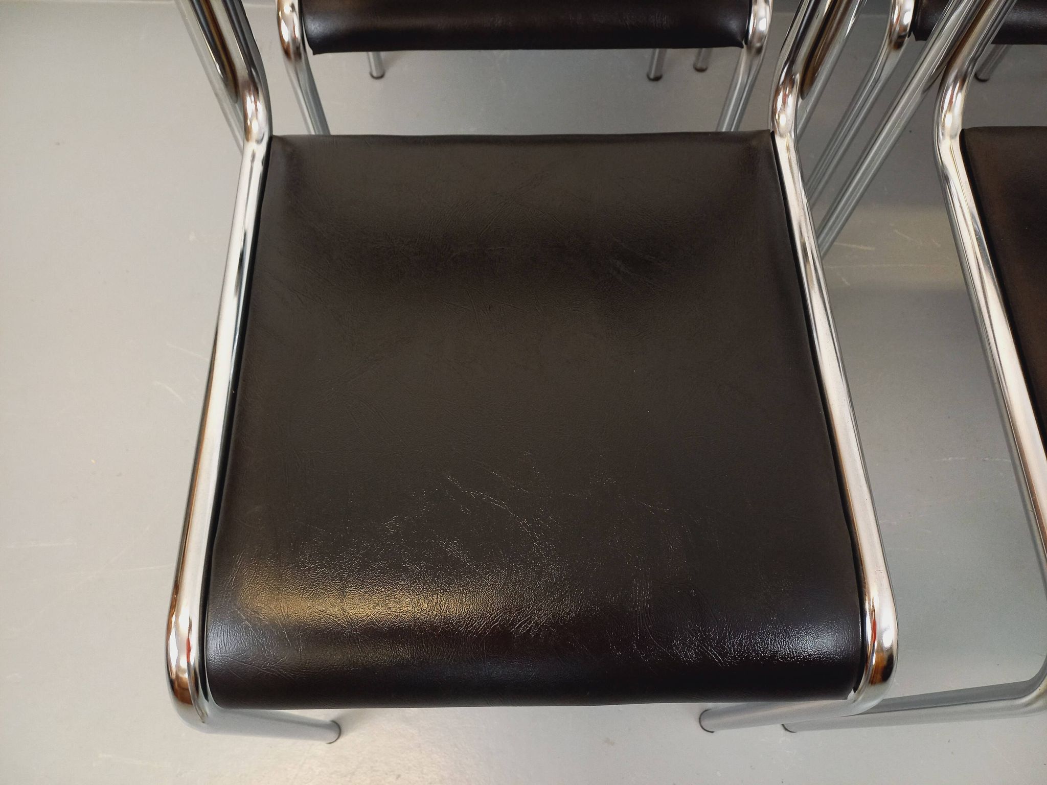 Set of 6 vintage Italian stackable chairs in chrome metal and skai.