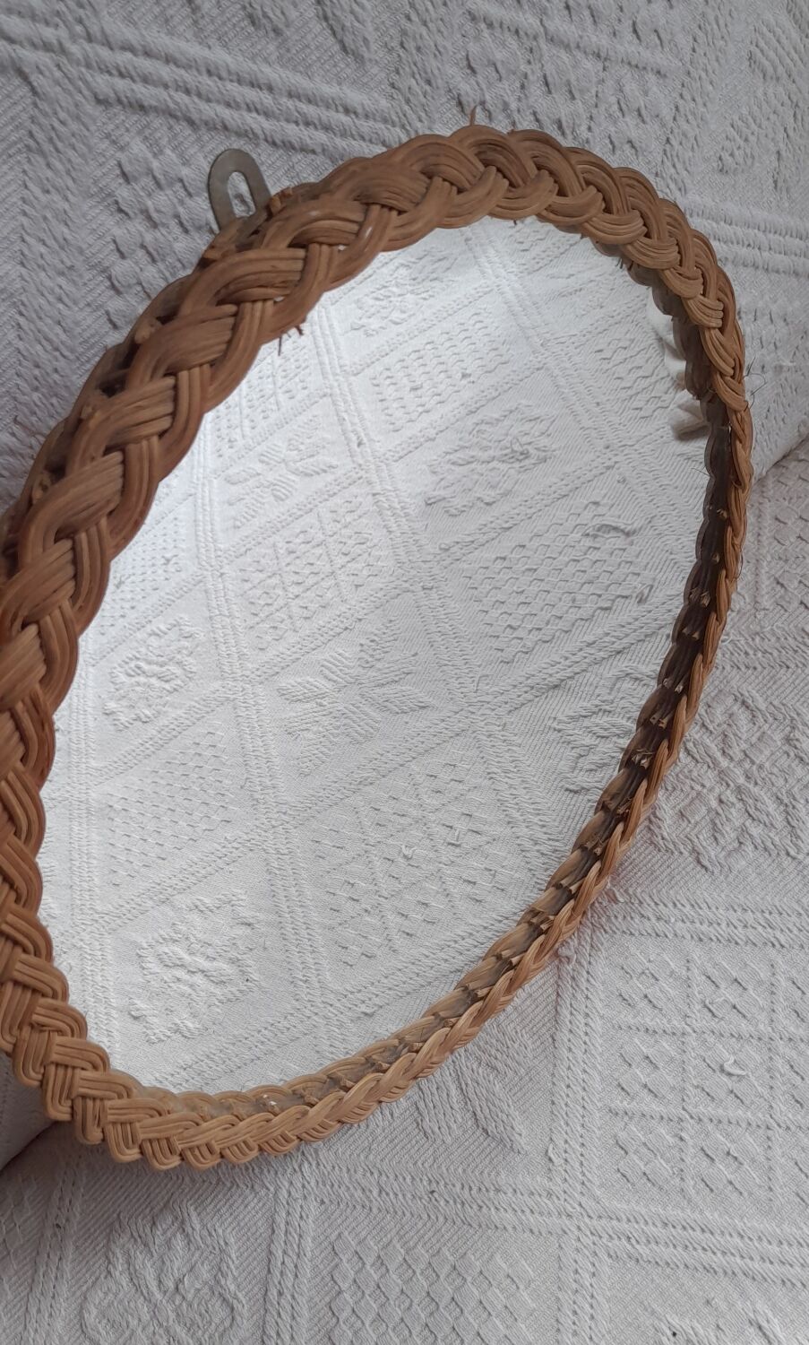Old vintage braided rattan mirror