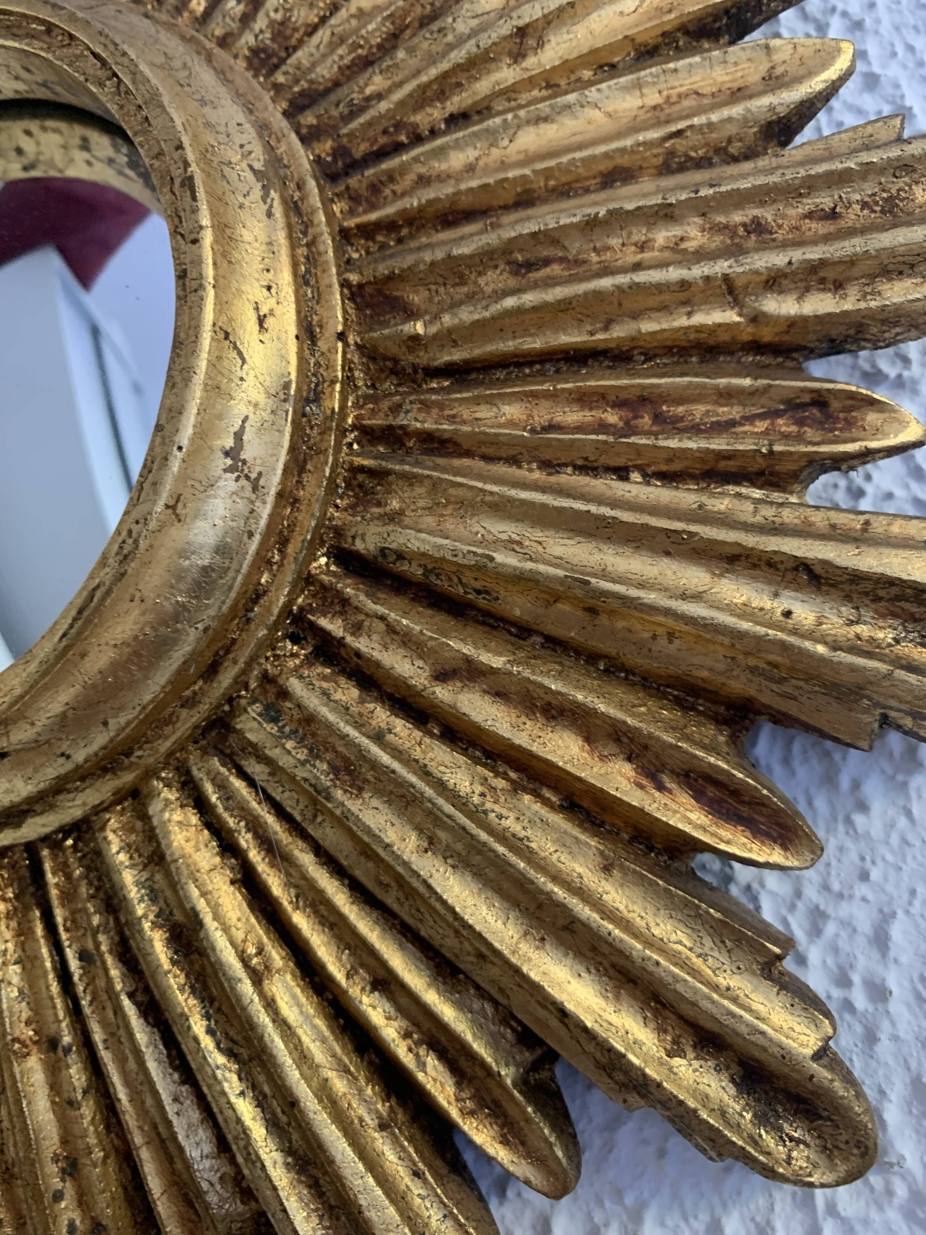 Vintage 1960s sunburst witch's eye mirror in gold - 27 cm