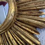 Vintage 1960s sunburst witch's eye mirror in gold - 27 cm