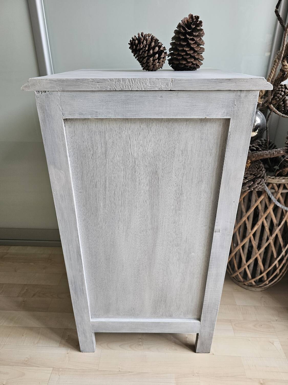Two solid wood bedside tables with calfskin decoration.
