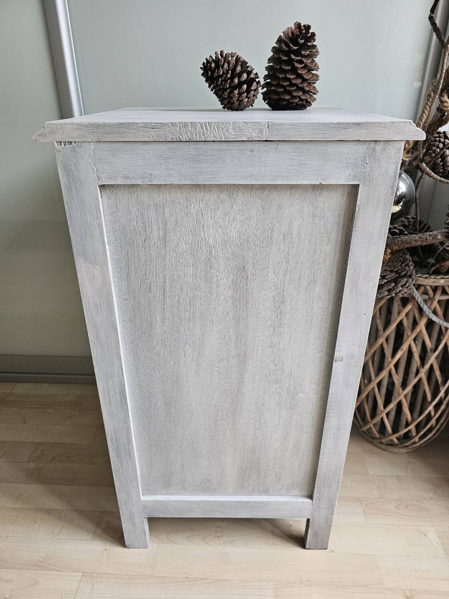 Two solid wood bedside tables with calfskin decoration.