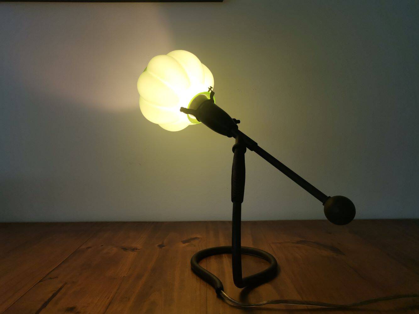 Modernist green cased glass and brass articulated table lamp