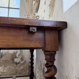 Paneled walnut desk with turned legs, 1900