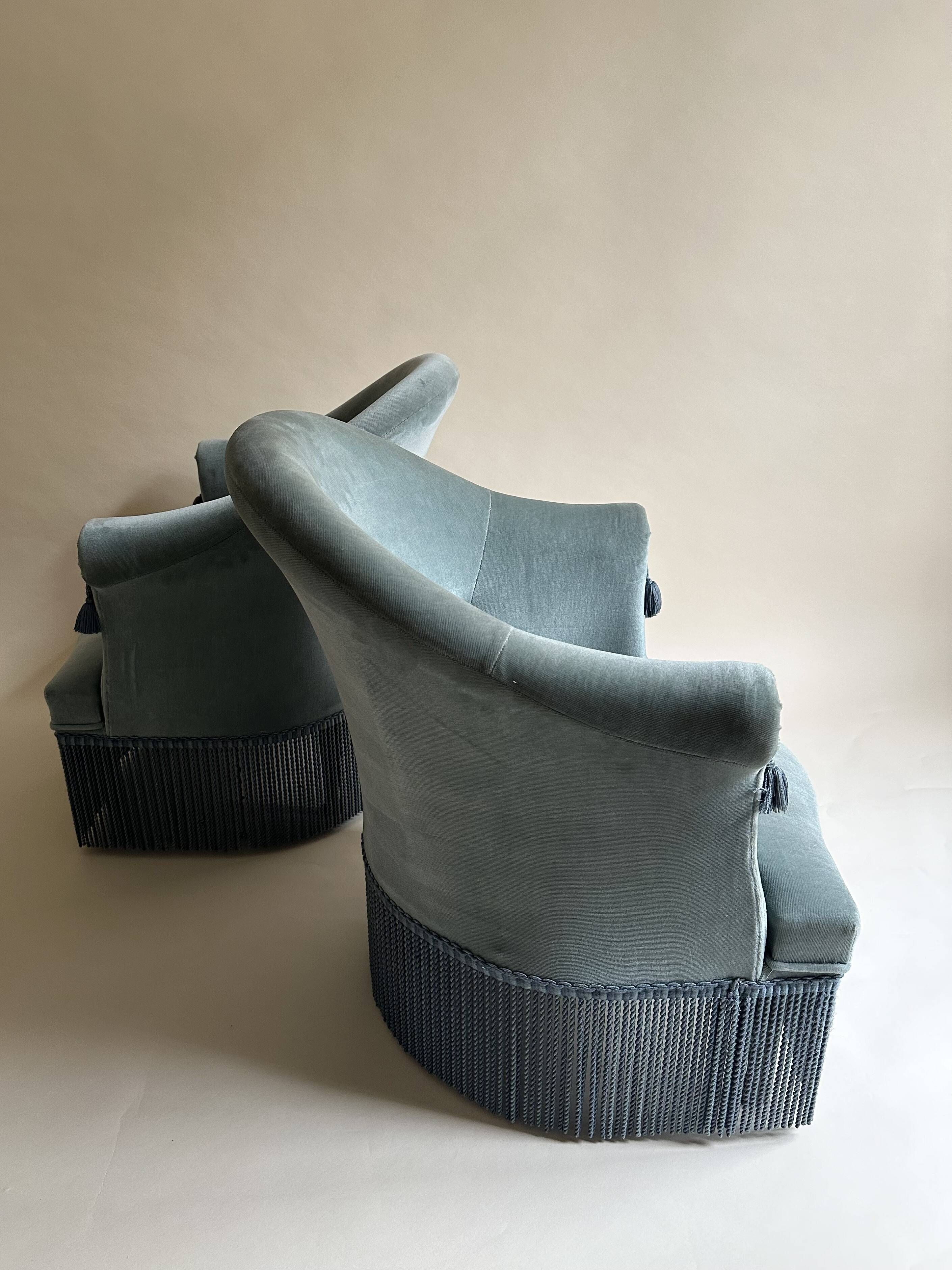 Blue velvet frog armchairs