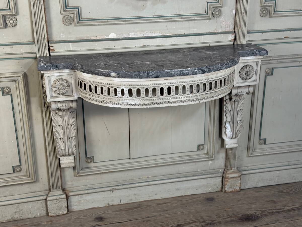 Louis XVI wall console in carved wood, grey patina, 18th century.