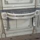 Louis XVI wall console in carved wood, grey patina, 18th century.