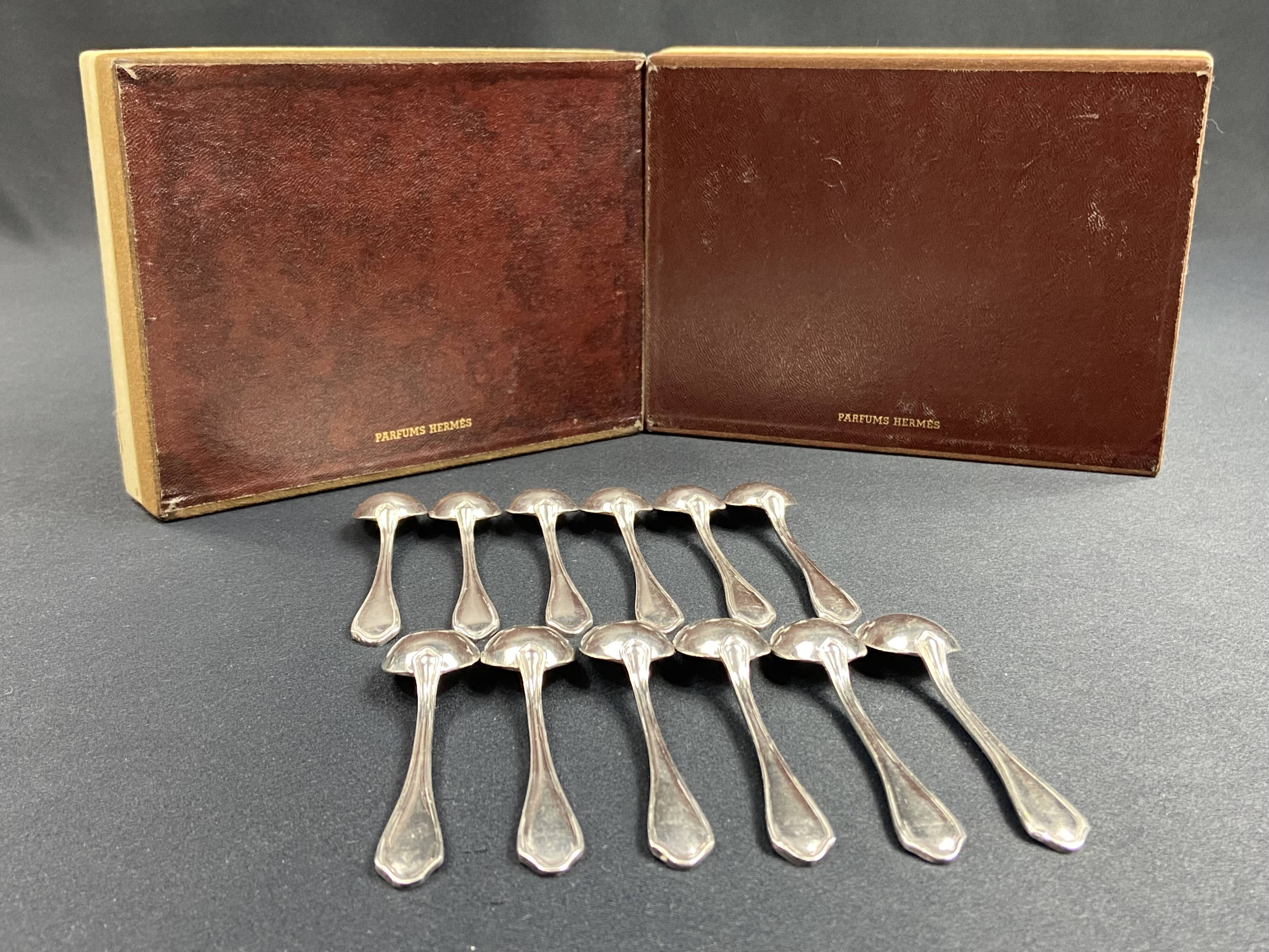 Complete set of 12 Louis XV style mocha spoons in silver-plated metal, Hermès