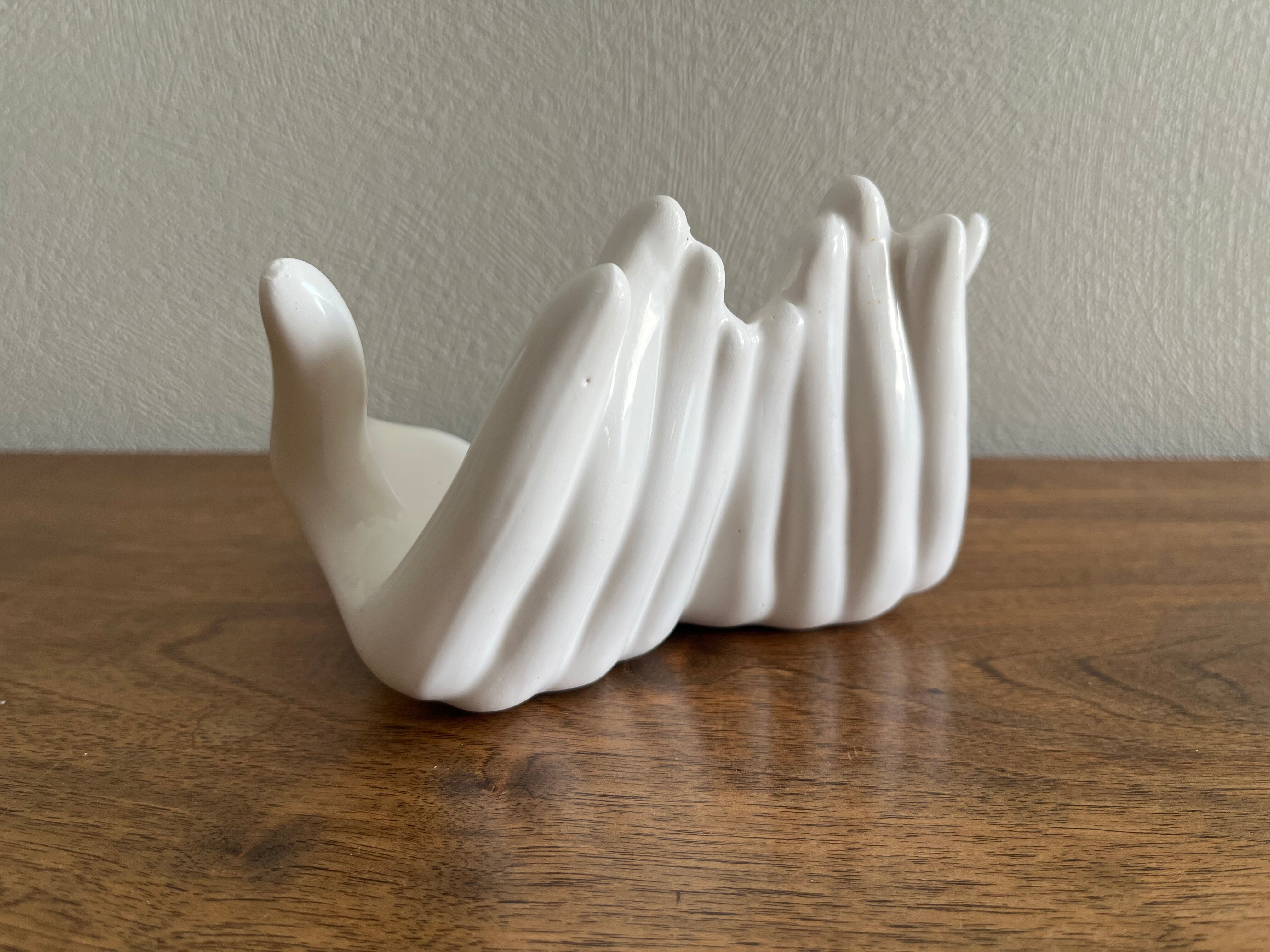 Empty white ceramic hand pocket