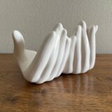 Empty white ceramic hand pocket