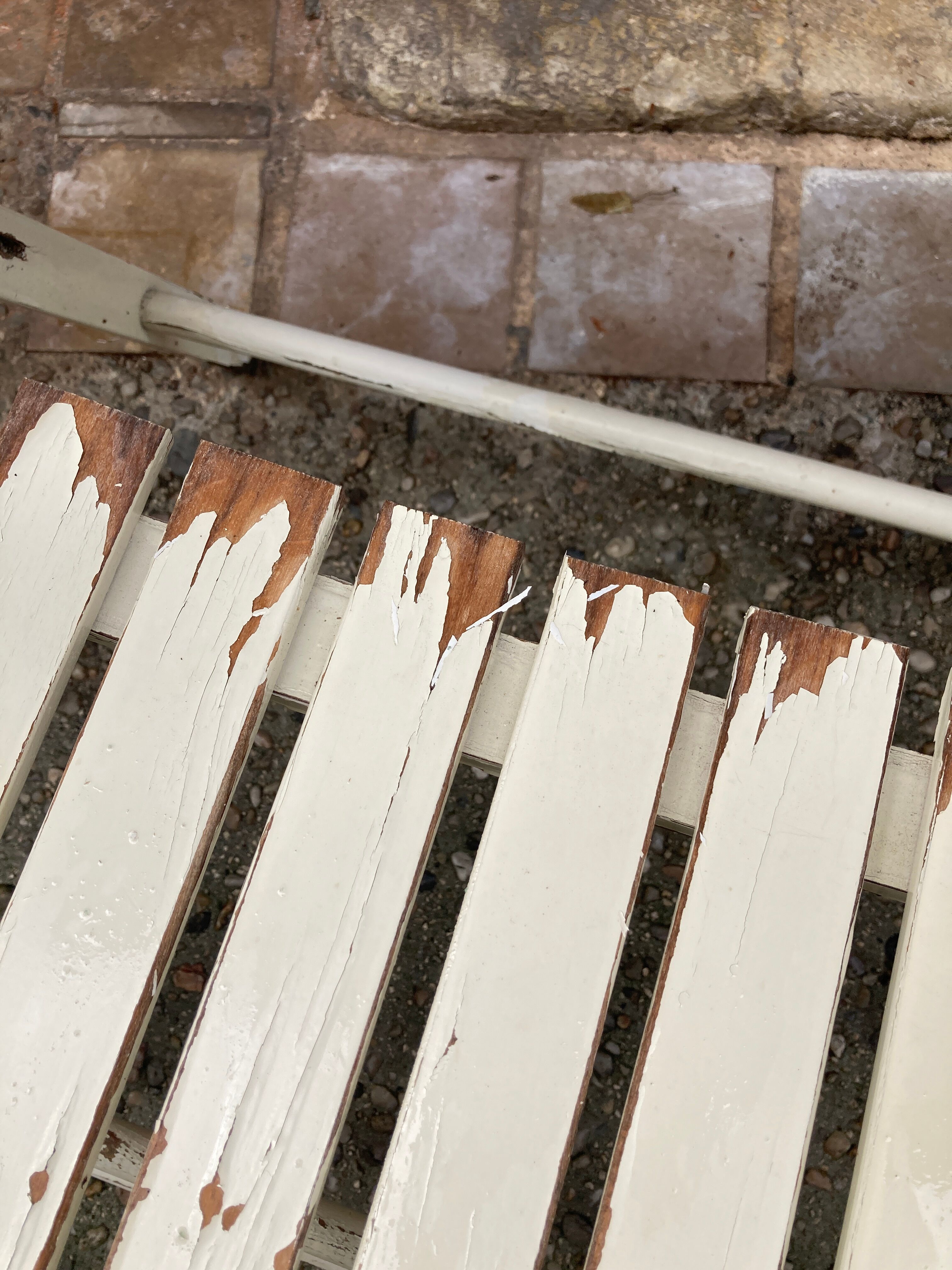 Five wooden garden armchairs