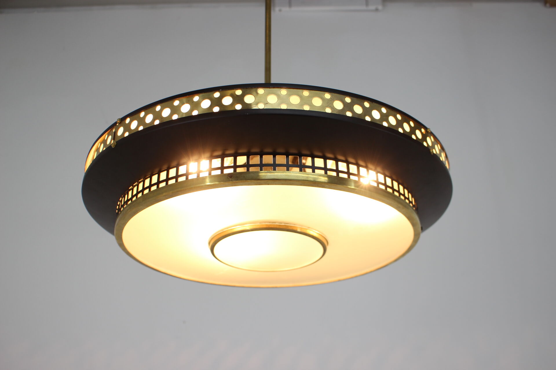 1960s black and gold UFO pendant , Czechoslovakia