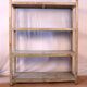 Teak bookshelf with original off-white patina.