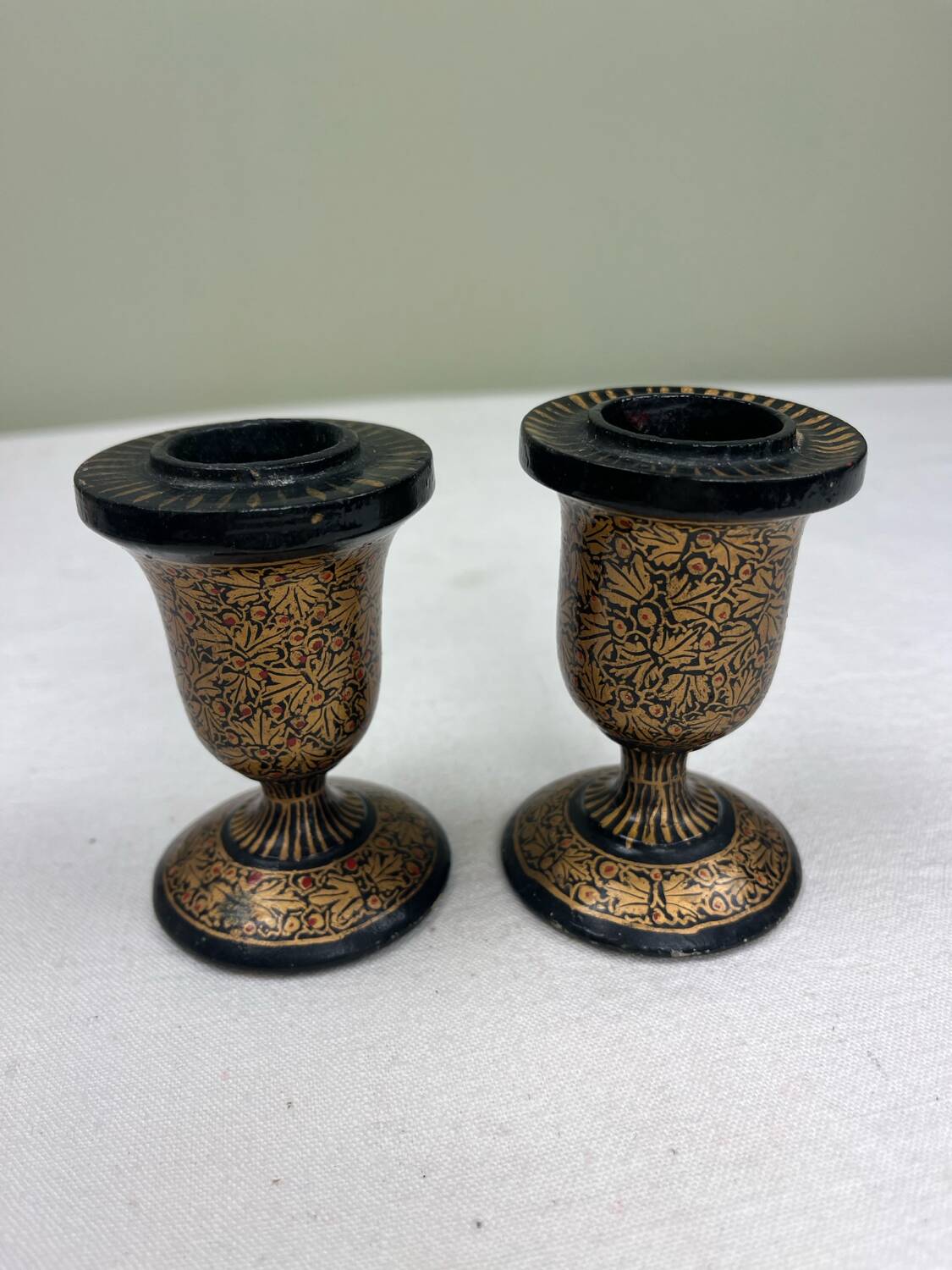 Pair of lacquered wooden candlesticks