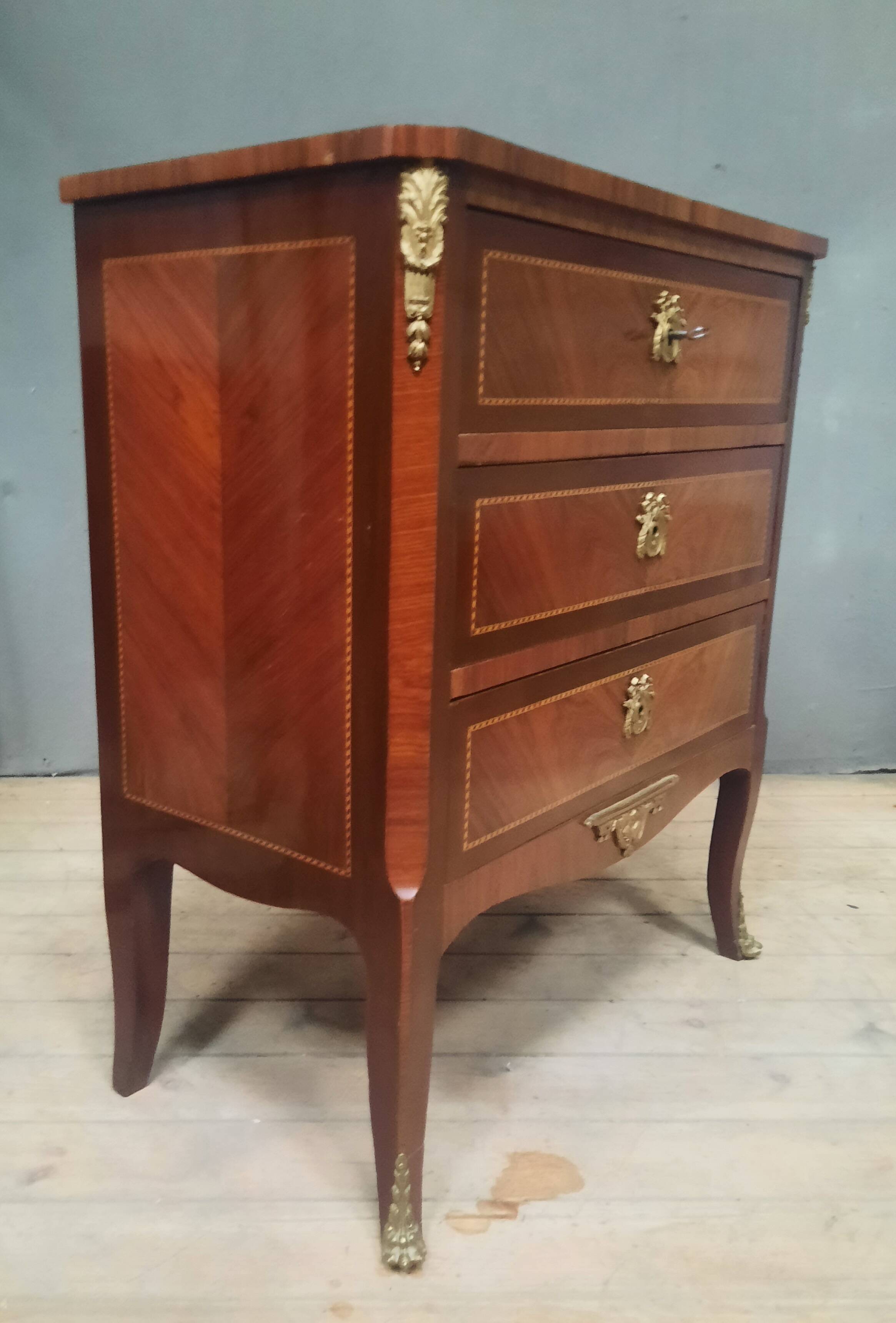 Small transitional style inlaid chest of drawers